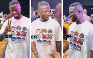 Actor Kwaku Manu wore a white T-shirt paired with red pants to the event