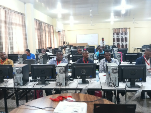 Photo of student seated at the workshop