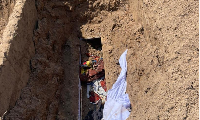 The grave of Agbobli was also found partially disturbed; however, the coffin remained intact