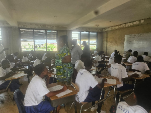 A picture of student seated for BECE