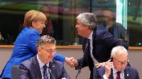 File Photo: German Chancellor, Angela Merkel, greets Eurogroup President, Mario Centeno