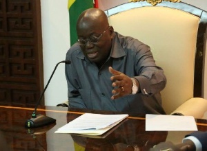 President John Mahama in a handshake with Nana Akufo-Addo