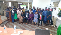 Participants of the stakeholders meeting pose for a photo