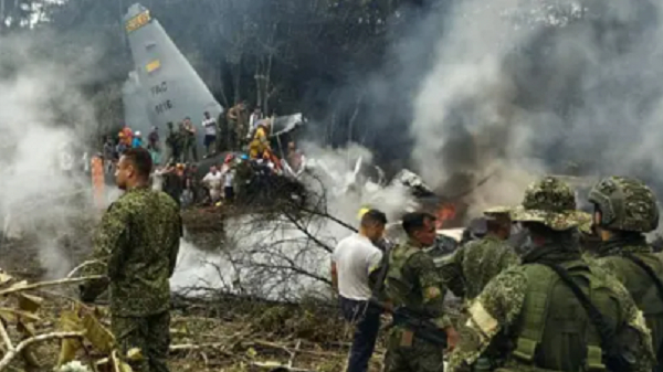Footage shows smoke and scattered debris from Air Force plane crash in Colombia