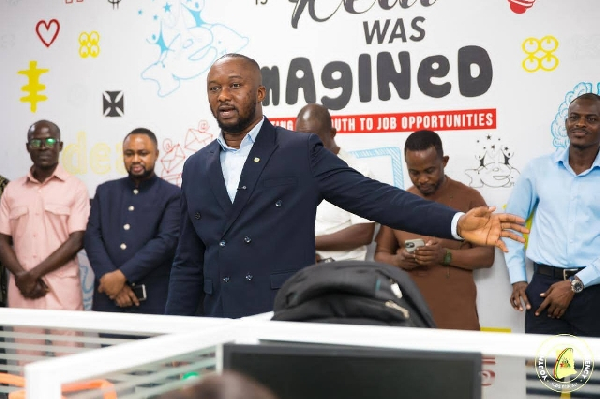 Malik Basintale (M) among other staff