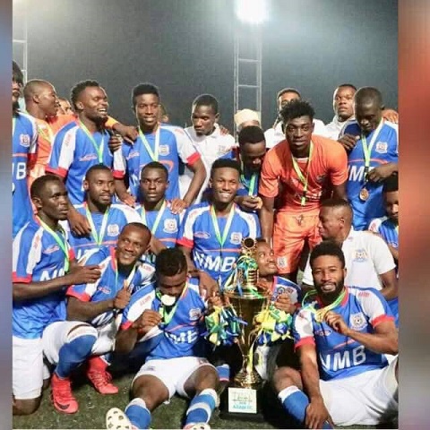 Azam FC players celebrate after winning the trophy