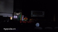 The lights at the Accra International Conference Centre went off as Jon Benjamin speaks.