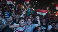 Egyptian fans celebrate as the Pharaohs reach their first World Cup since 1990