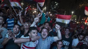 Egyptian fans celebrate as the Pharaohs reach their first World Cup since 1990