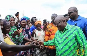 President Akufo-Addo exchanging pleasantries with the people of Beposo in the Ashanti region
