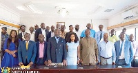 Isaac Asiamah with heads and members of the various committees after the swearing-in