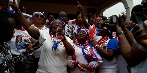 Abena Durowaa Mensah (holding a microphone) with some NPP supporters