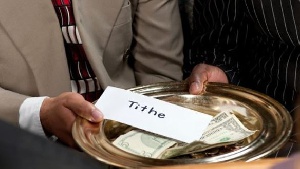 Payment of tithe. File photo