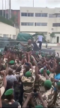 Gabonese soldiers celebrating  Coup Leader, Lt. Col. Ulrich Madoumbi