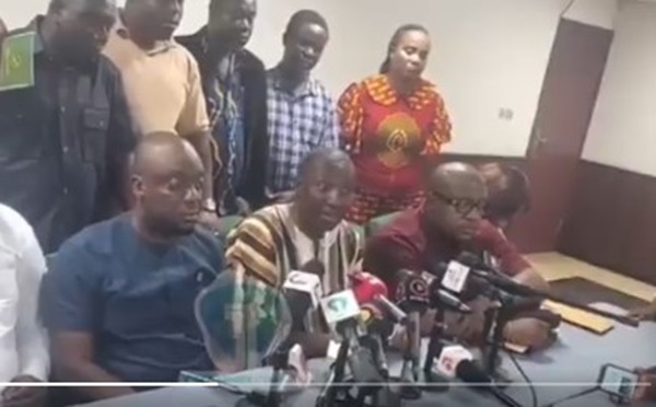 Minority Leader, Alexander Afenyo-Markin seated in the middle addressing the press