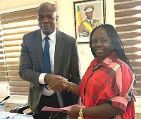 Mrs Asante and Mr Abdulai in a hand shake after the meeting