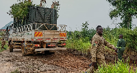 A truck carrying Nubian giraffes as rangers prepare for their translocation
