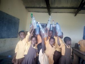 Some of the school pupils holding their bottled water