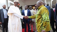 President Nana Addo Dankwa Akufo-Addo in a handshake with President Buhari