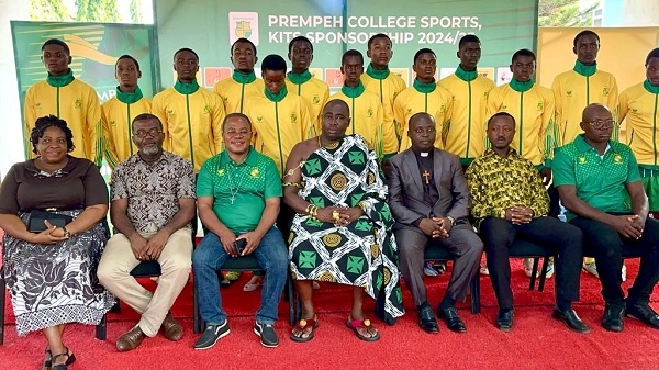 Student footballers and executives captured in a photo