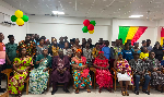 Participants of the training pose for a photo