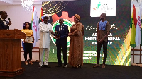 Alhaji Dr. Umar Babs Bodinga (middle) receiving his award