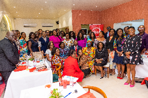 Absa Bank Senior Management pose with mothers