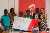 Afua Ansah (3rd from left) receiving the scholarship package from Airtel