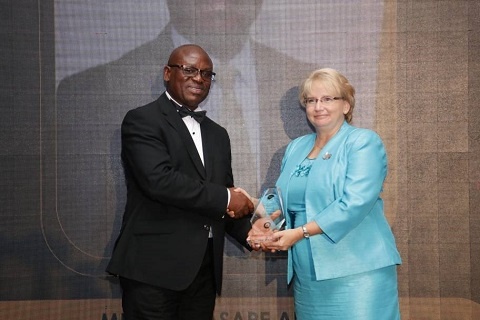 Director General of the Ghana Ports and Harbours Authority, Paul Asare Ansah (L) receiving an award