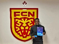 Michael Essien showing his UEFA License A certificate