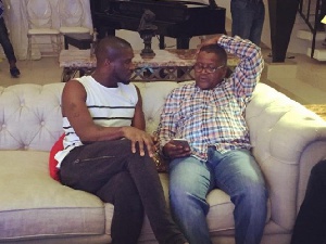 Peter Okoye (L) with Aliko Dangote (R)