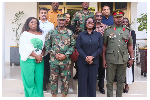 Obuobia Darko-Opoku (M) in a group photo with GAF, Defence Ministry, and DIHOC representatives