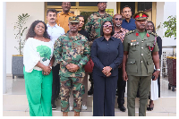 Obuobia Darko-Opoku (M) in a group photo with GAF, Defence Ministry, and DIHOC representatives