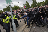 A scene from the ongoing anti-immigrant protest in UK