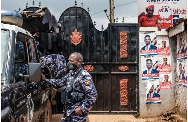 A police car outside the headquarters of the Uganda's opposition party National Unity Platform