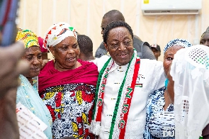 Dr Duffuor with some hardworking women during one of his tours around the country