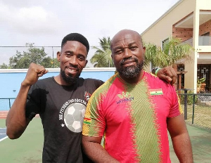 Ghanaian fitness coach Leonard Akoto (L) and McDan