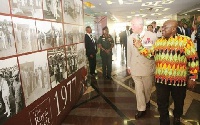 President Akufo-Addo and the Prince of Wales inspecting an exhibition at the Jubilee House