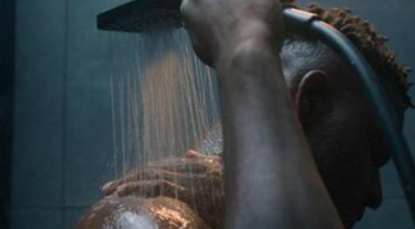 File photo of a man taking a shower