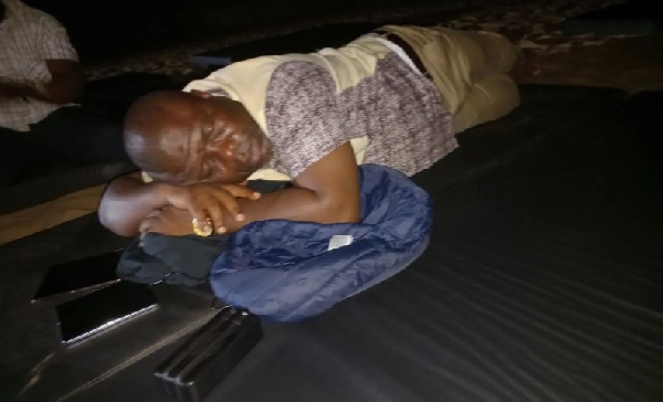 Volta Regional Minister, James Gunu spending the night with displaced persons