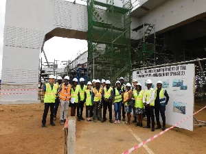 The JICA team and Japanese embassy delegation at the site