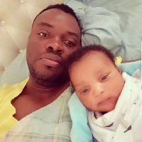 John Kwadwo Germain with baby