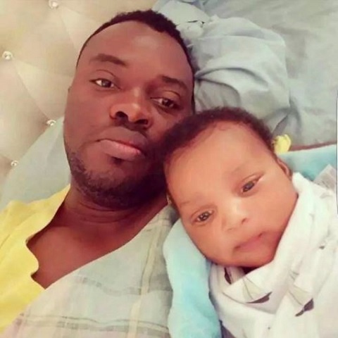 John Kwadwo Germain with baby