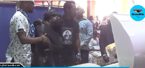 The late Ekow Blankson's wife being consoled