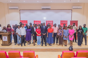 Absa Bank Ghana’s Finance team with students at Academic City University College