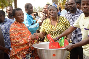 Nana Oye Lithur, Minister for Gender, Children and Social Protection donating the items