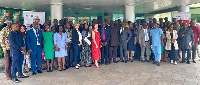 Representatives of development partners and government officials in a group photo