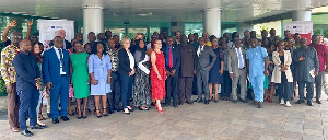 Representatives of development partners and government officials in a group photo