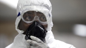 A medical technician works inside a mobile lab set up to test rapidly for Ebola virus in Butembo A medical technician works inside a mobile lab set up to test rapidly for Ebola virus in Butembo