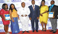 Host of the show, Mr. Djokoto (in white), in a pose with some officials of TV3 and production team